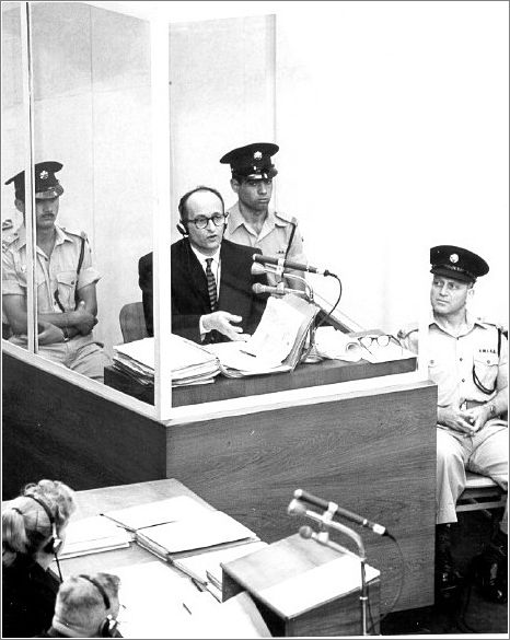 Eichmann behind protective glass at his trial